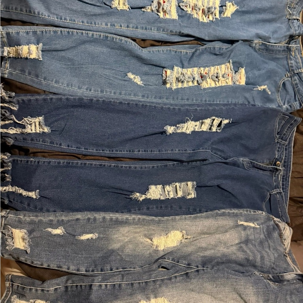 Distressed Blue Denim Jeans